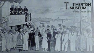 A black and white photo showing a cast of amateur actor in various costumes, including sailor uniforms, and dresses, on a stage in front of a theatre set.