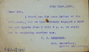 The printed text on this postcard reads: 'Dear Sir, I thank you for your letter of the 29th. inst., but we have already engaged a Bank for out Sports from 2 till 9pm so shall not be requiring another one. T.J. Melhuish. Hon. Secretary, Sports Committee.' It is dated July 31st. 1923.