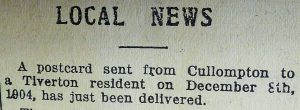 Cutting from a 1923 newspaper that reads: 'A postcard sent from Cullompton to a Tiverton resident on December 8th, 1904, has just been delivered.' 