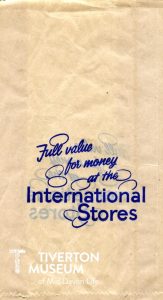 Paper bag from International Stores with the tag line 'full value for money'