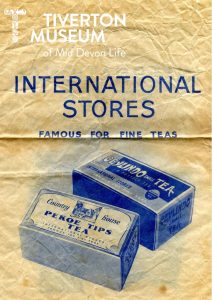 A paper bag from 'International Stores' with the tag line 'famous for fine teas'.